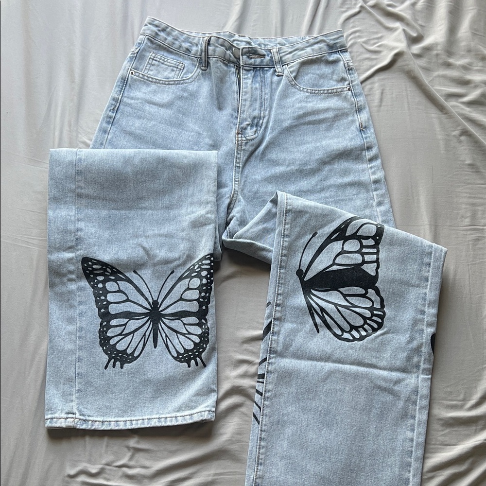 SHEIN Light Blue Jeans with Black Butterfly Print